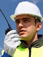 Guy talking on a radio
